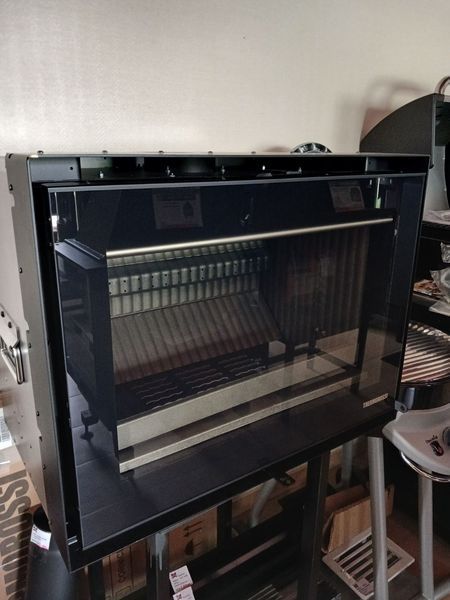 Вбудований дров'яний камін SKYLINE 540 Thermorossi з системою Airbox та рамкою SKYLINE 540 фото